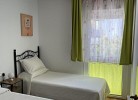 Schlafzimmer mit zwei Einzelbetten