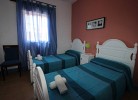 Schlafzimmer mit zwei Einzelbetten