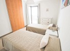 Schlafzimmer mit zwei Einzelbetten 2