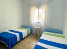 Schlafzimmer mit zwei Einzelbetten 1