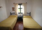 Schlafzimmer mit zwei Einzelbetten