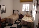 Schlafzimmer mit zwei Einzelbetten