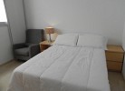 Schlafzimmer mit Doppelbett